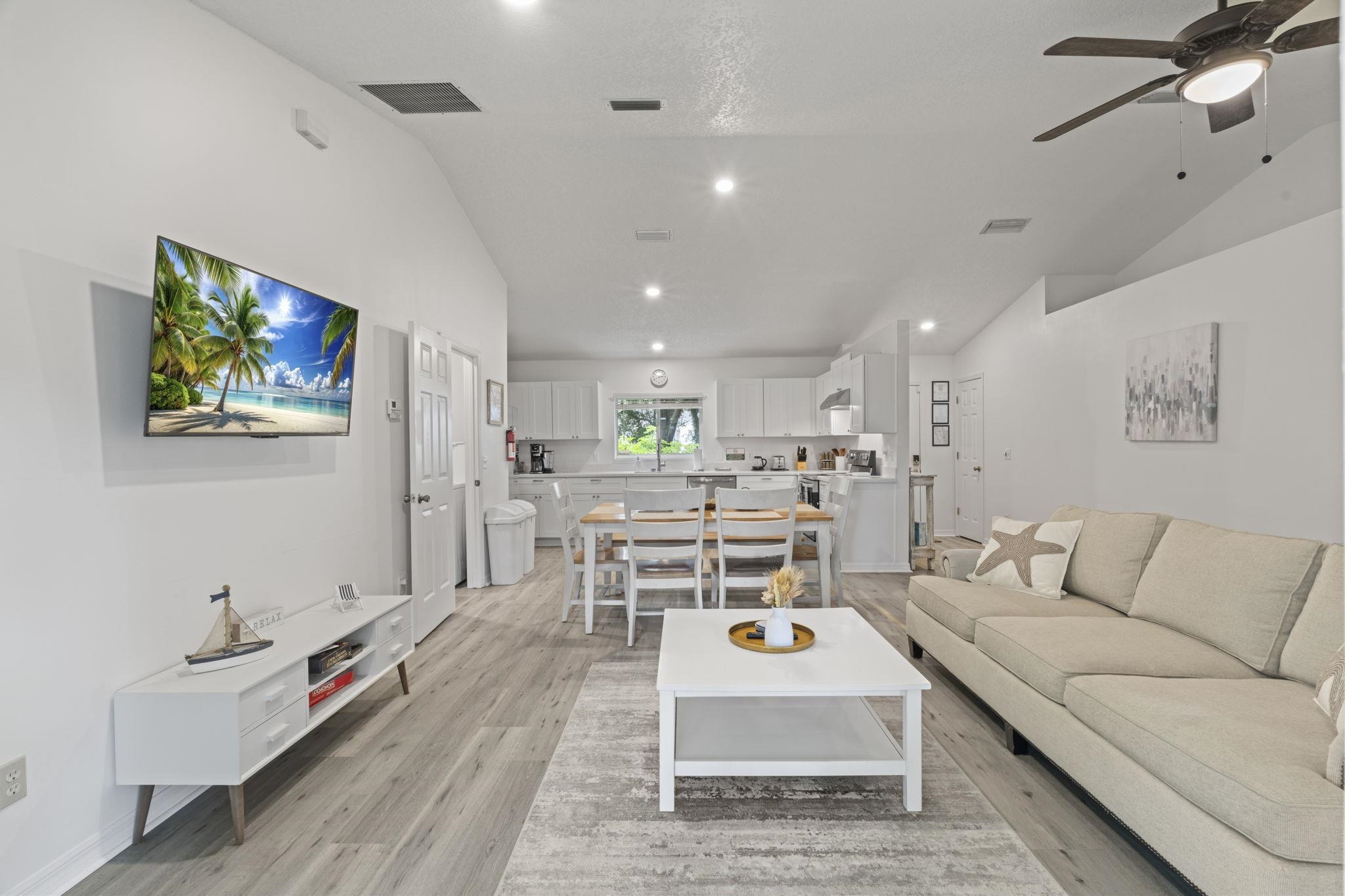 110 Dory Road St. Augustine, FL 32086 - Photo 7 of 35 a living room with furniture and a flat screen tv