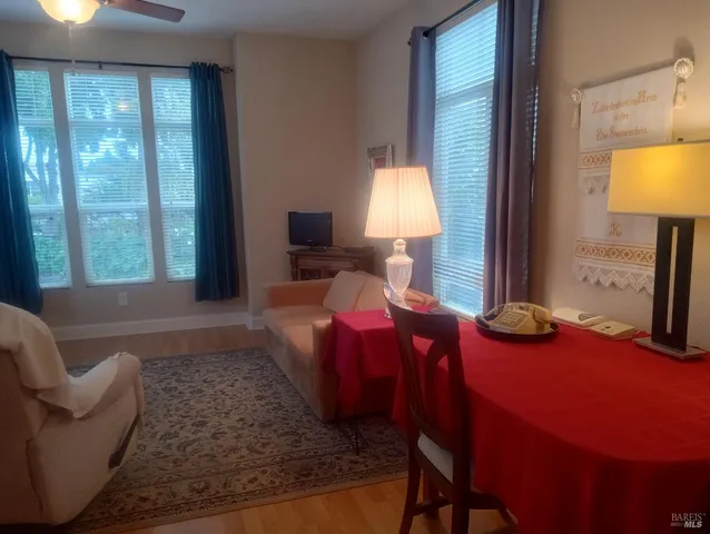 a bathroom with a sink mirror and vanity