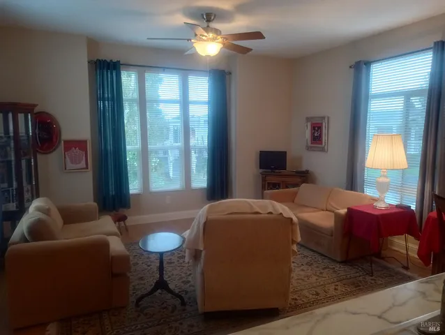 a white cabinet with wide window