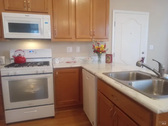 front view of a house with a garden