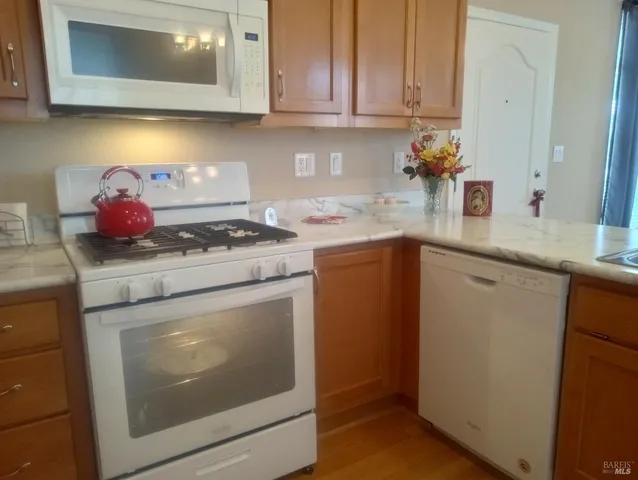 swimming pool with outdoor seating and yard