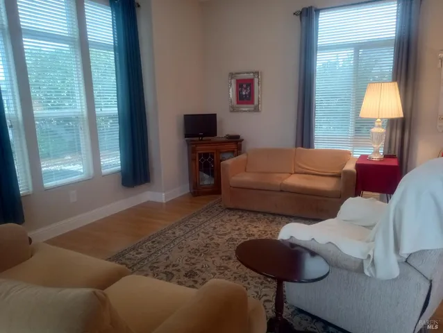 a kitchen with a refrigerator and cabinets
