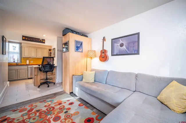 a living room with furniture and a couch