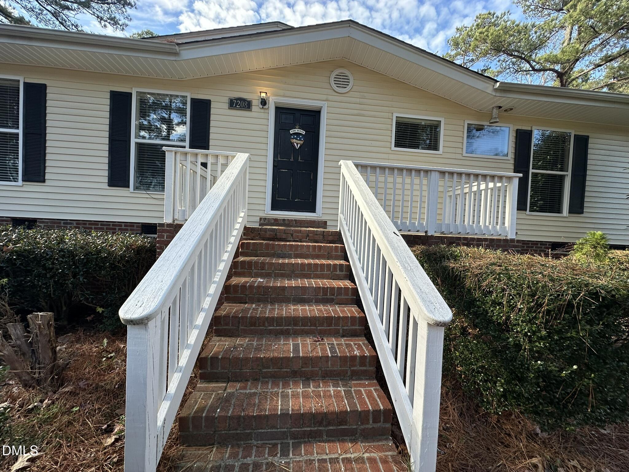 7208 Eastover Drive Raleigh, NC 27603 - Photo 2 of 41 a view of entryway with a front door