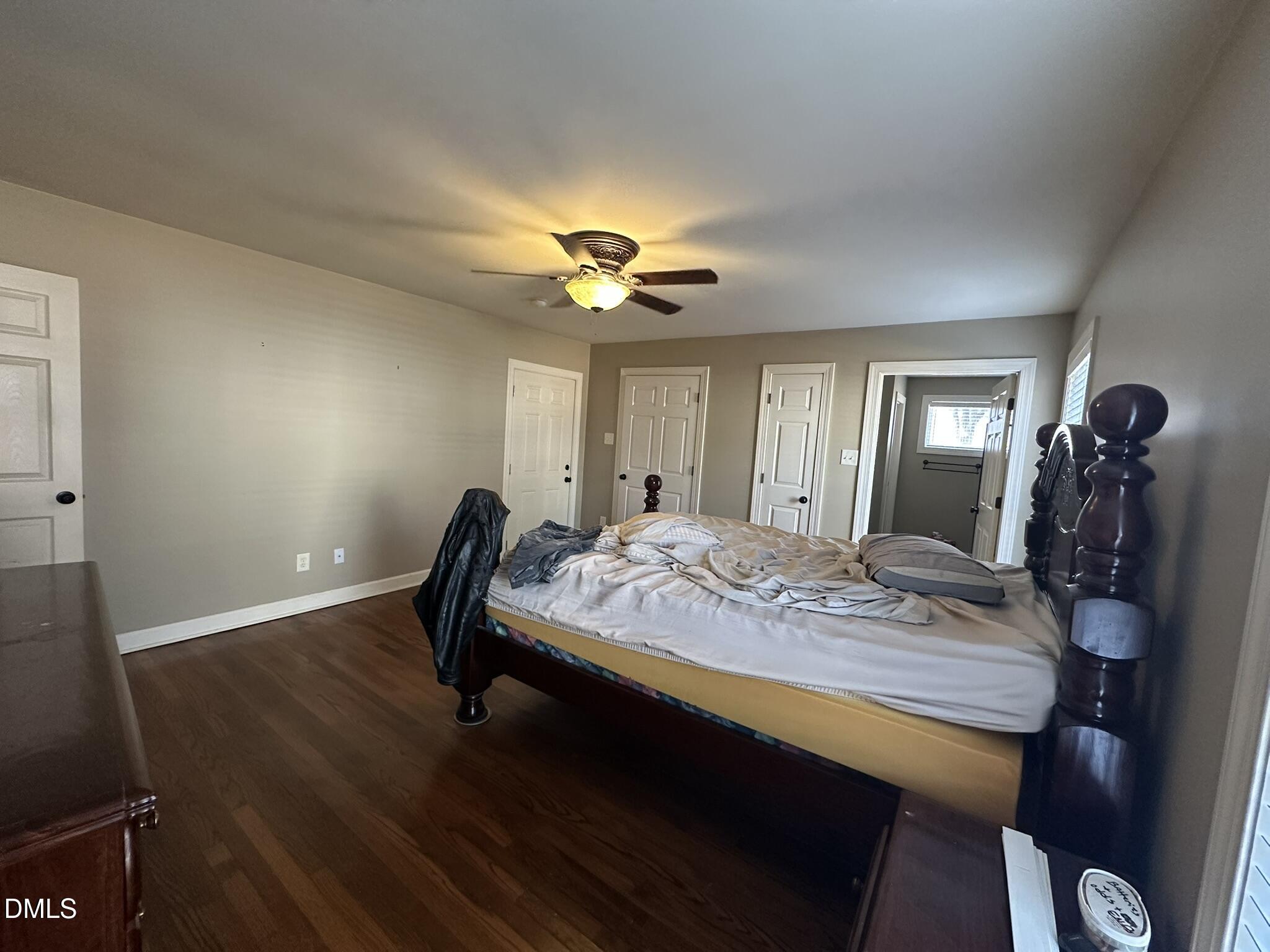 7208 Eastover Drive Raleigh, NC 27603 - Photo 25 of 41 a bed sitting in a spacious bedroom next to a window