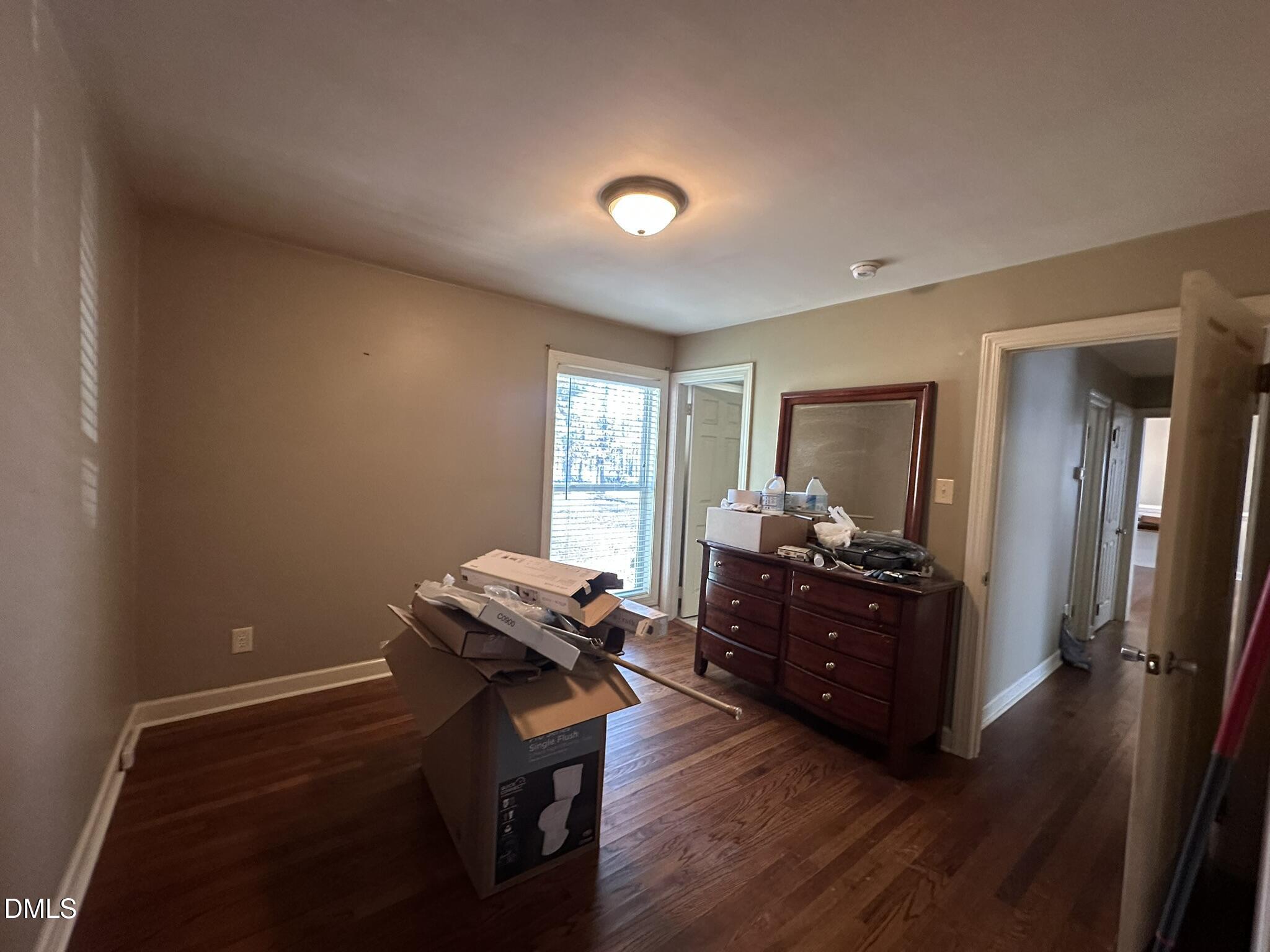 7208 Eastover Drive Raleigh, NC 27603 - Photo 29 of 41 a living room with furniture and a window