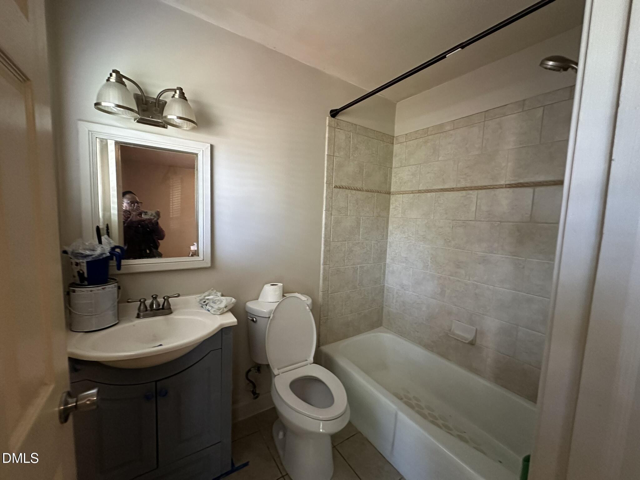 7208 Eastover Drive Raleigh, NC 27603 - Photo 31 of 41 a bathroom with a sink toilet and shower
