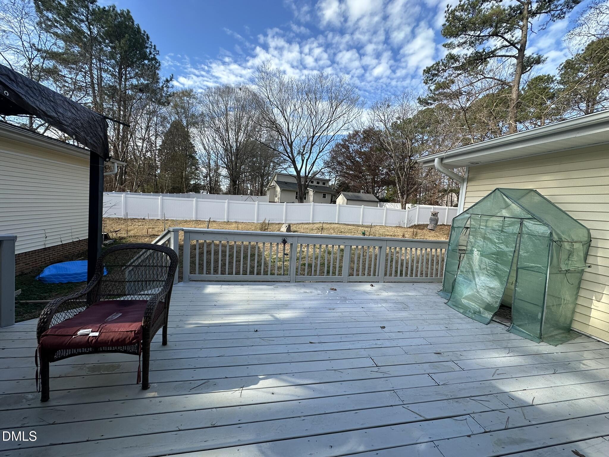 7208 Eastover Drive Raleigh, NC 27603 - Photo 41 of 41 a view of a wooden deck with a bench