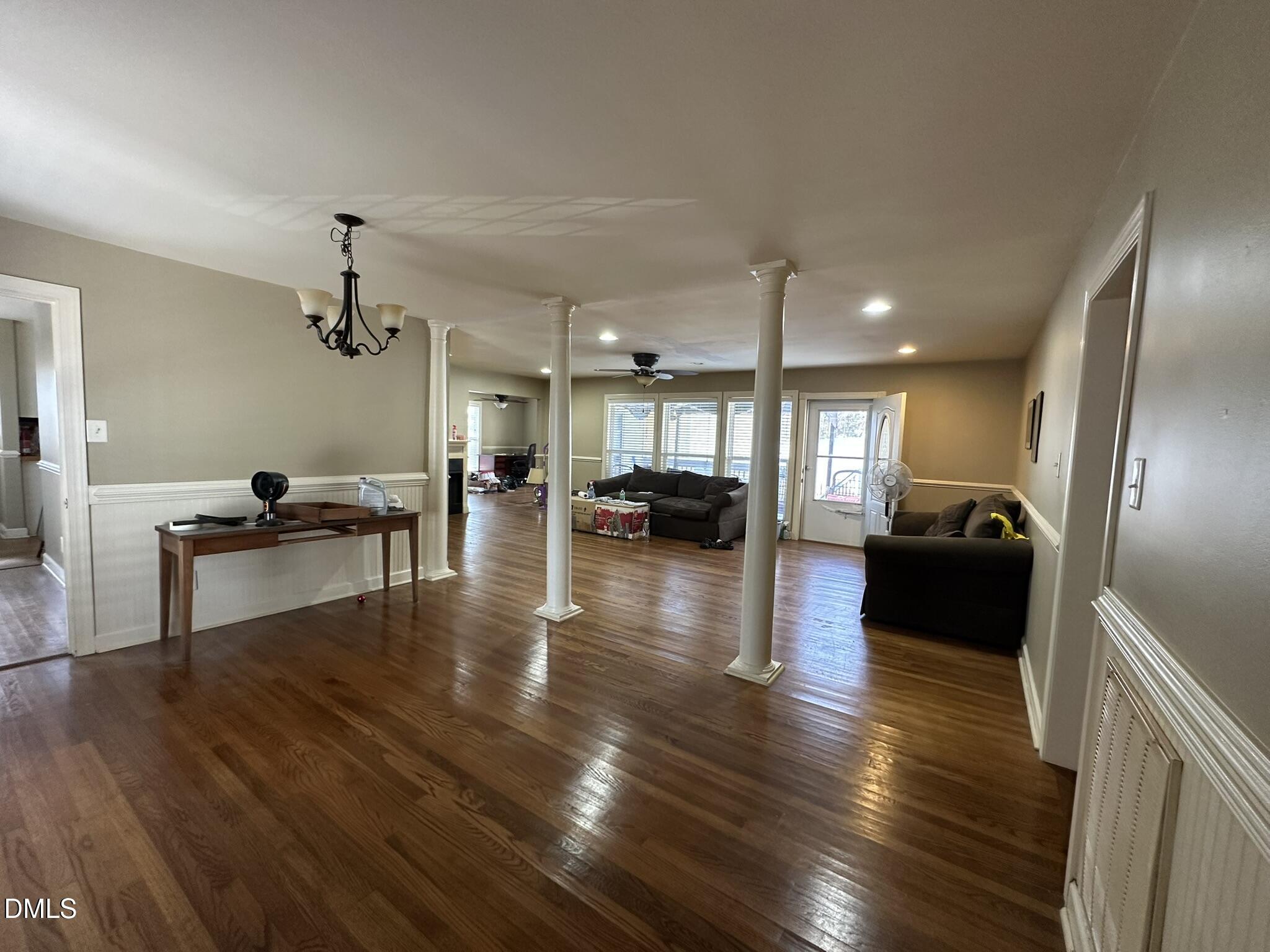 7208 Eastover Drive Raleigh, NC 27603 - Photo 5 of 41 a living room with furniture and a wooden floor