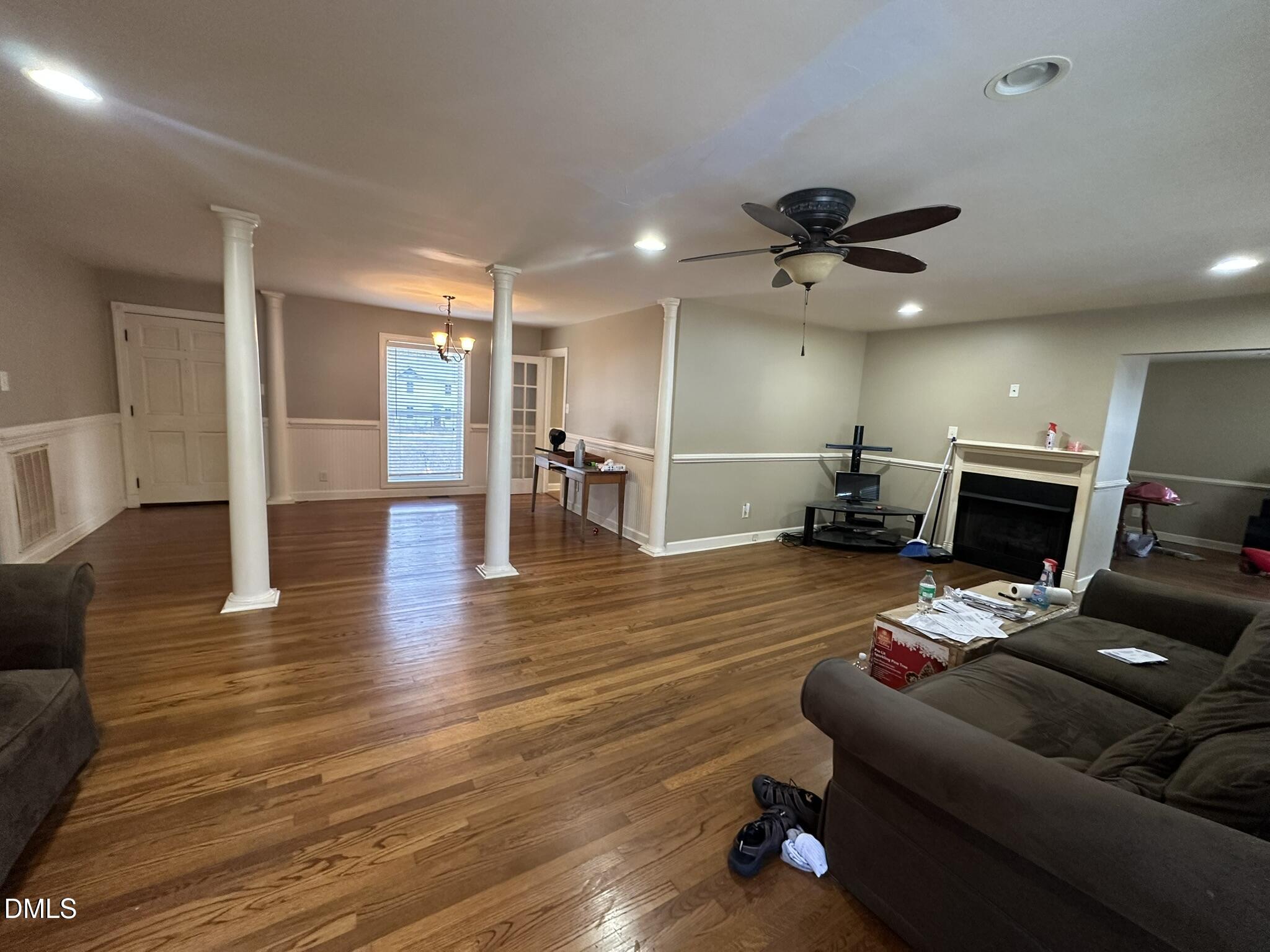 7208 Eastover Drive Raleigh, NC 27603 - Photo 9 of 41 a living room with furniture and a fireplace
