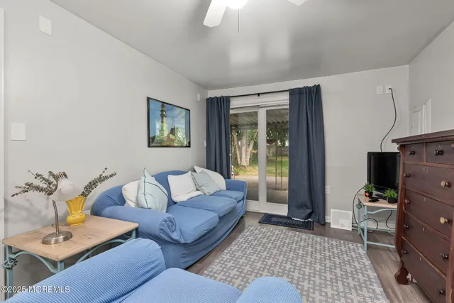 a living room with furniture and a couch