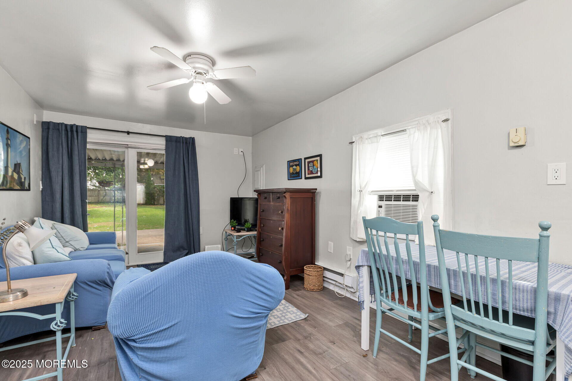 301 Norwood Avenue, Unit 3 Long Branch, NJ 07740 - Photo 6 of 17 a living room with furniture and a window