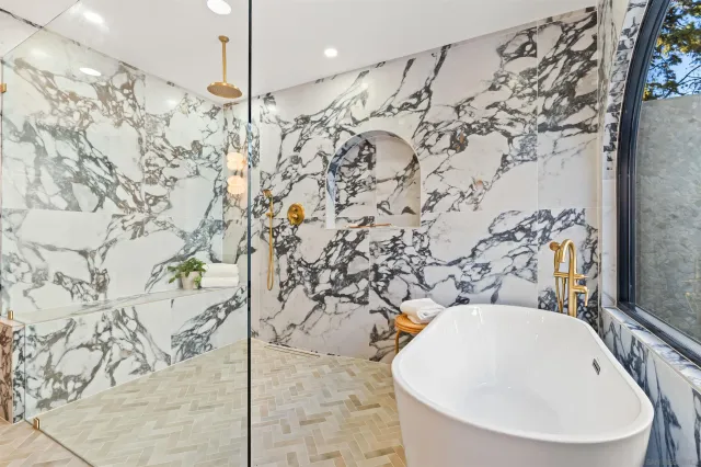 a kitchen with sink cabinets and a window