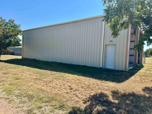 a bathroom with a sink and a yard