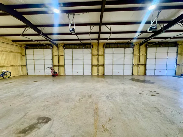 a view of a backyard of the house