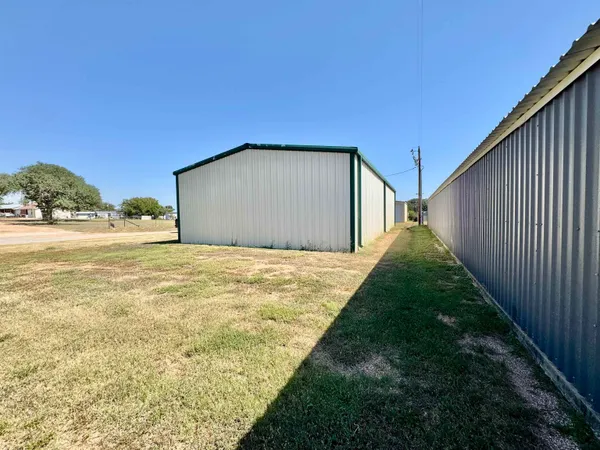 a view of swimming pool with outdoor seating
