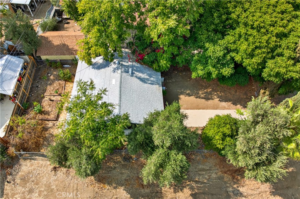 17653 Raley Avenue Lake Elsinore, CA 92530 - Photo 21 of 29 an aerial view of a house with a yard and lake view