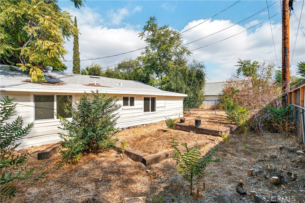 17653 Raley Avenue Lake Elsinore, CA 92530 - Photo 27 of 29 a view of a house with a yard and sitting area