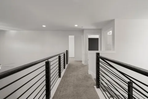 a view of hallway with stairs