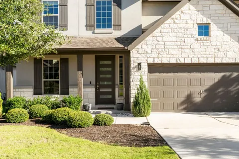 a view of a entryway door front of house