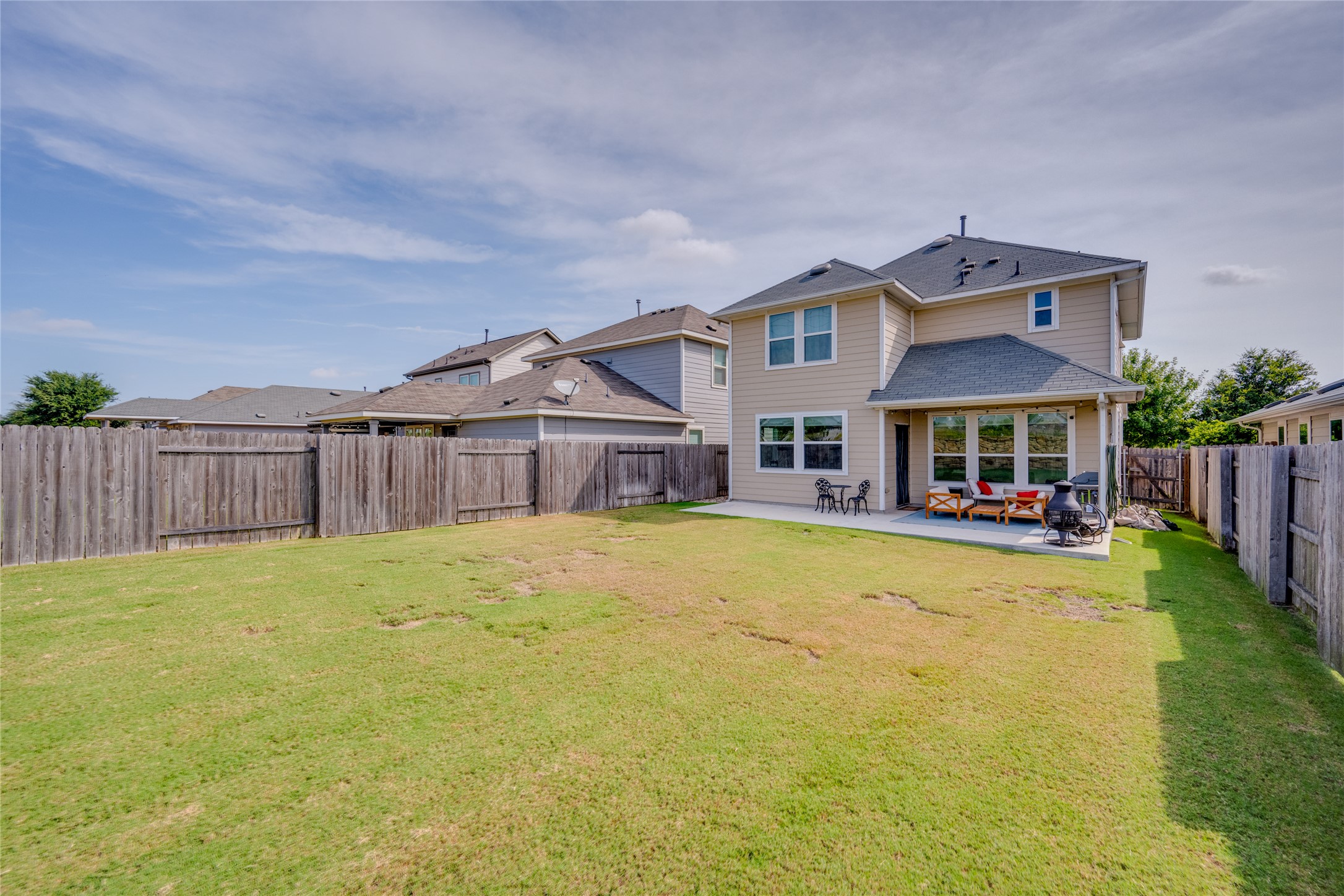 7948 Castelardo Place Round Rock, TX 78665 - Photo 31 of 32 a front view of house with yard outdoor seating and barbeque oven
