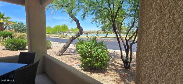 a view of a garden from a balcony