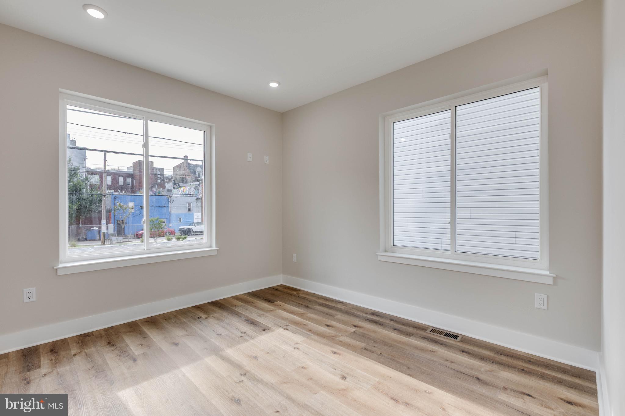 1434 Parrish Street, Unit B Philadelphia, PA 19130 - Photo 7 of 17 an empty room with a window