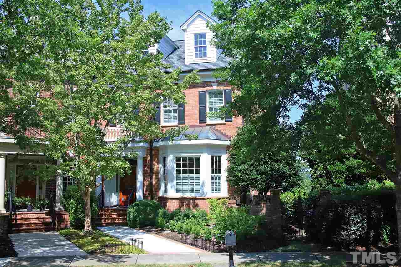 Lovely brick traditional townhome in Meadowmont, conveniently located to UNC, Duke and Research Triangle Park.