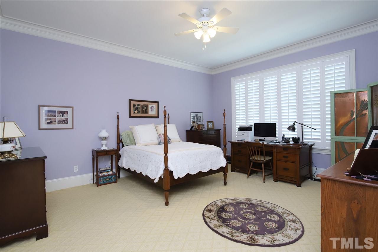 207 Oval Park Place Chapel Hill, NC 27517 - Photo 13 of 30 The large master suite features a comfortably sized bedroom, a walk in closet and a master bath.