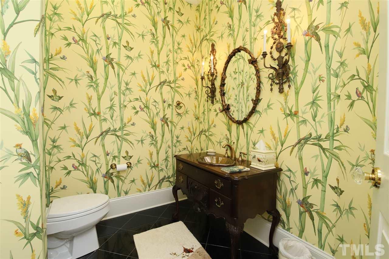 207 Oval Park Place Chapel Hill, NC 27517 - Photo 15 of 30 The powder room is on the main level of the home, adjacent to foyer and living room.