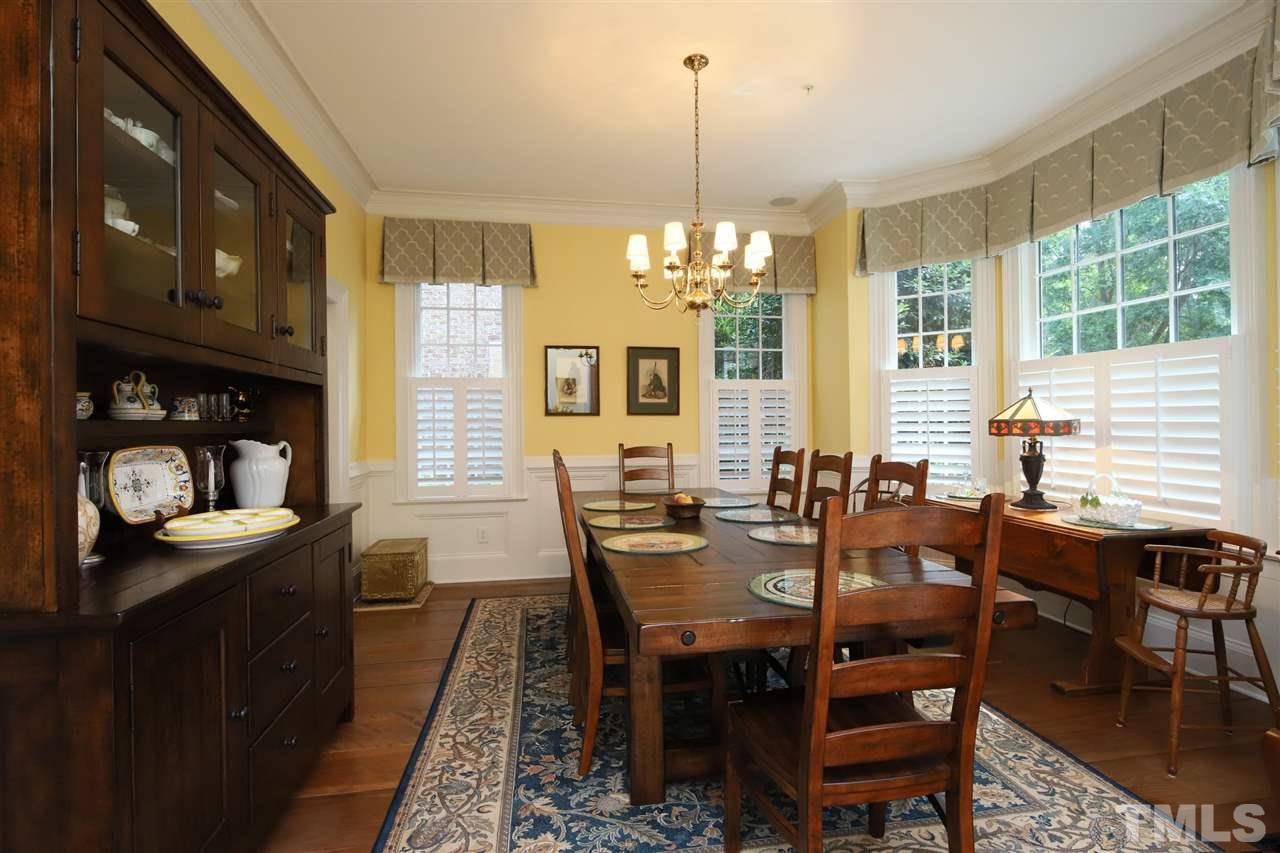 207 Oval Park Place Chapel Hill, NC 27517 - Photo 3 of 30 The generously sized dining room is ready to host family and friends.