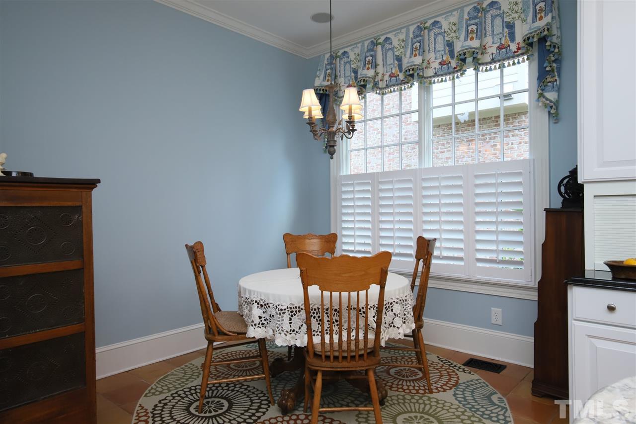 207 Oval Park Place Chapel Hill, NC 27517 - Photo 6 of 30 The cozy breakfast room adjoins the kitchen.