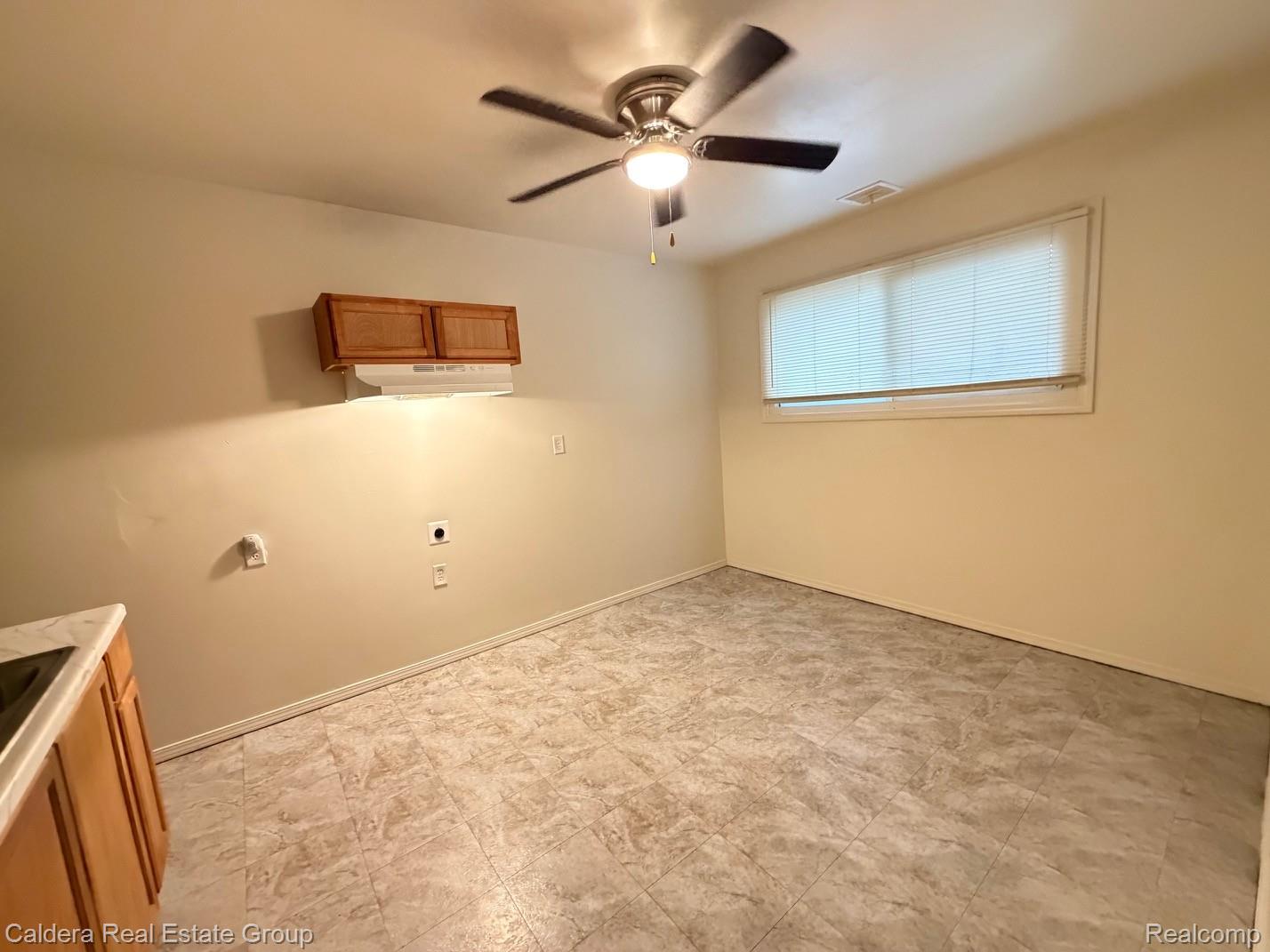 15354 Lahser Road Detroit, MI 48223 - Photo 6 of 10 Washroom with baseboards and ceiling fan