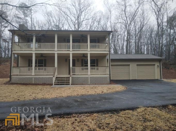 53 Camp Sunrise Road Northwest Cartersville, GA 30121 - Photo 1 of 1 a house with a window