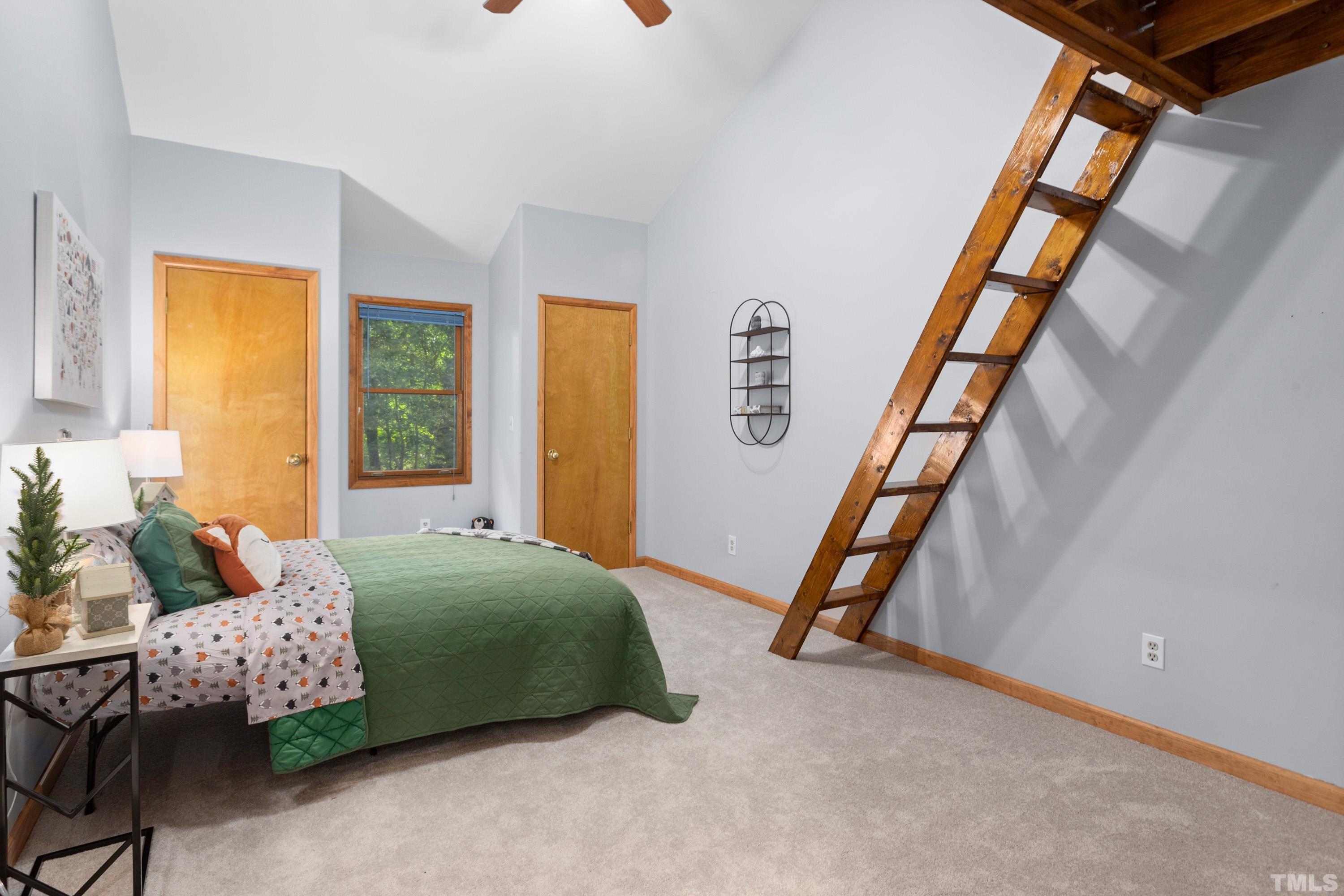 2600 Ferrand Drive Durham, NC 27705 - Photo 19 of 67 a bedroom with furniture and a window