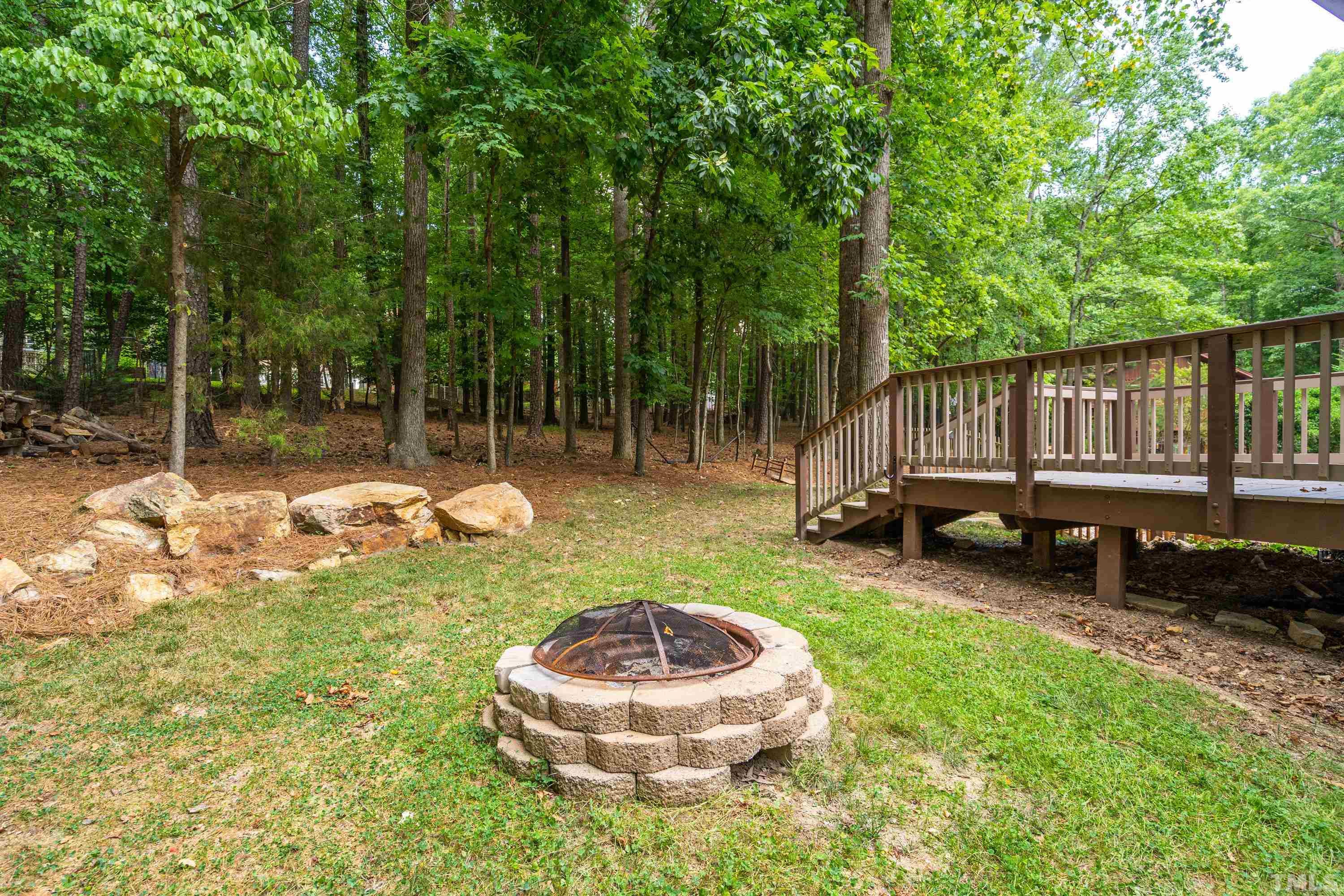 2600 Ferrand Drive Durham, NC 27705 - Photo 40 of 67 a backyard of a house with barbeque oven