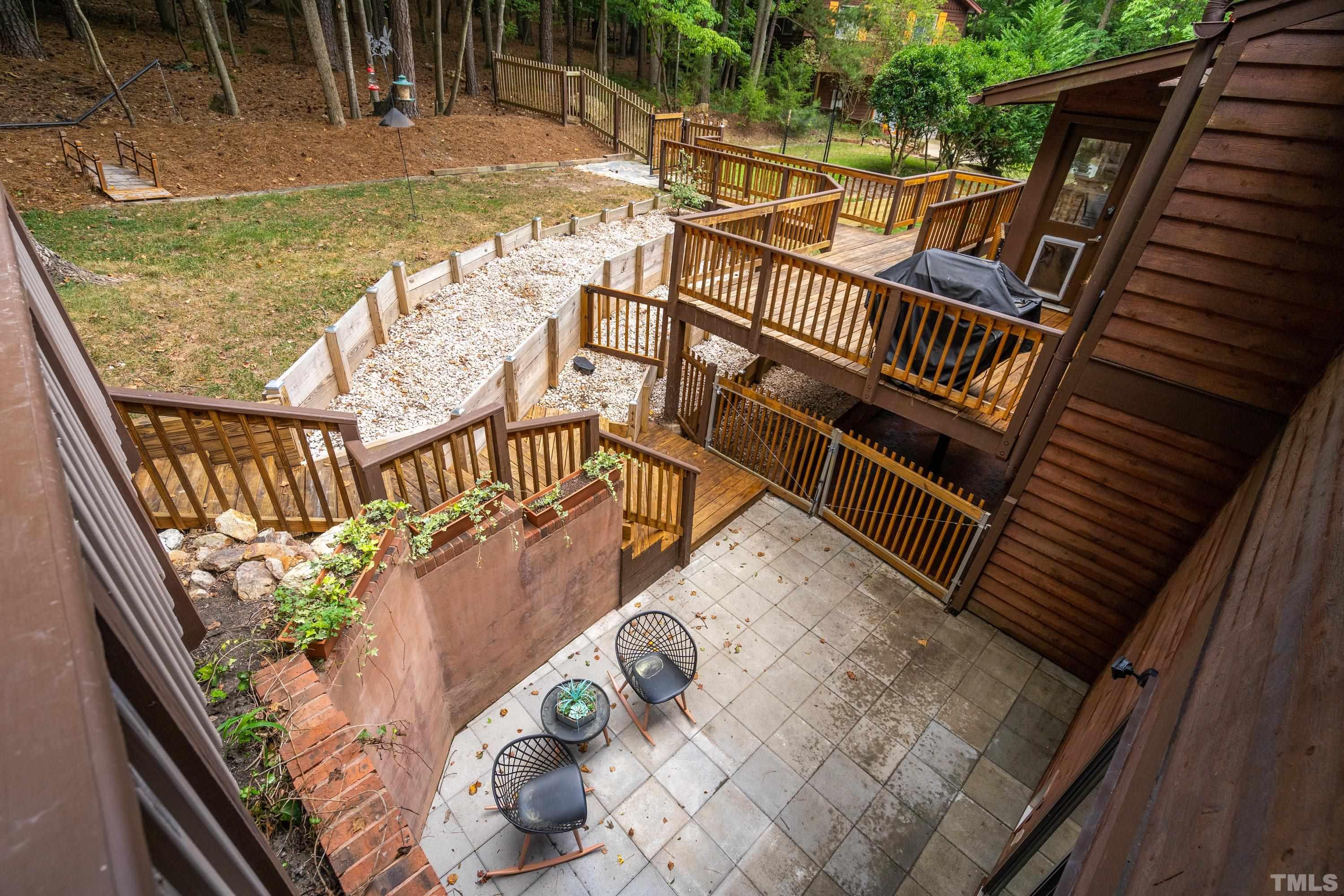 2600 Ferrand Drive Durham, NC 27705 - Photo 41 of 67 a view of a balcony with wooden floor