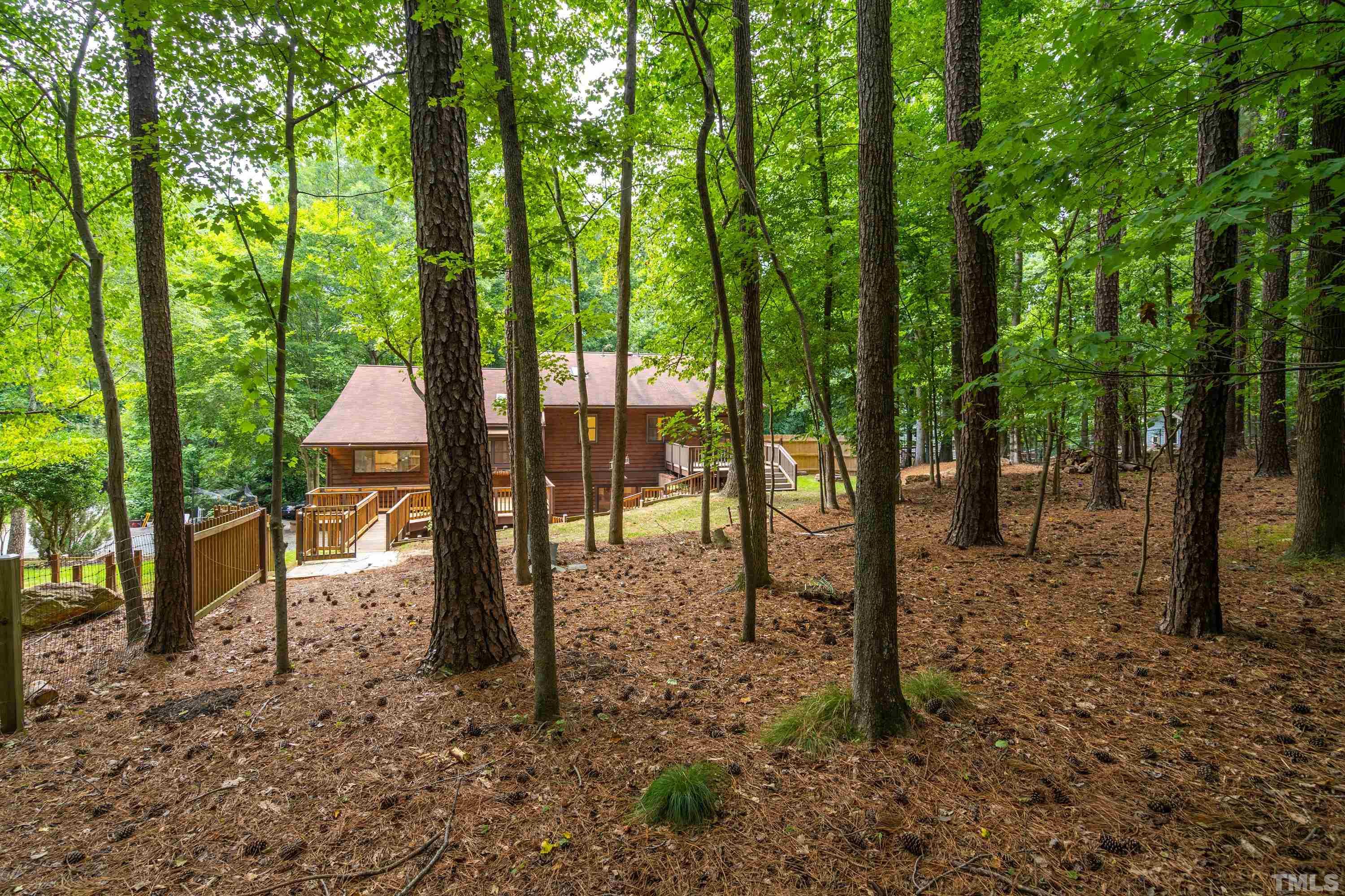 2600 Ferrand Drive Durham, NC 27705 - Photo 49 of 67 a view of outdoor space with lots of trees