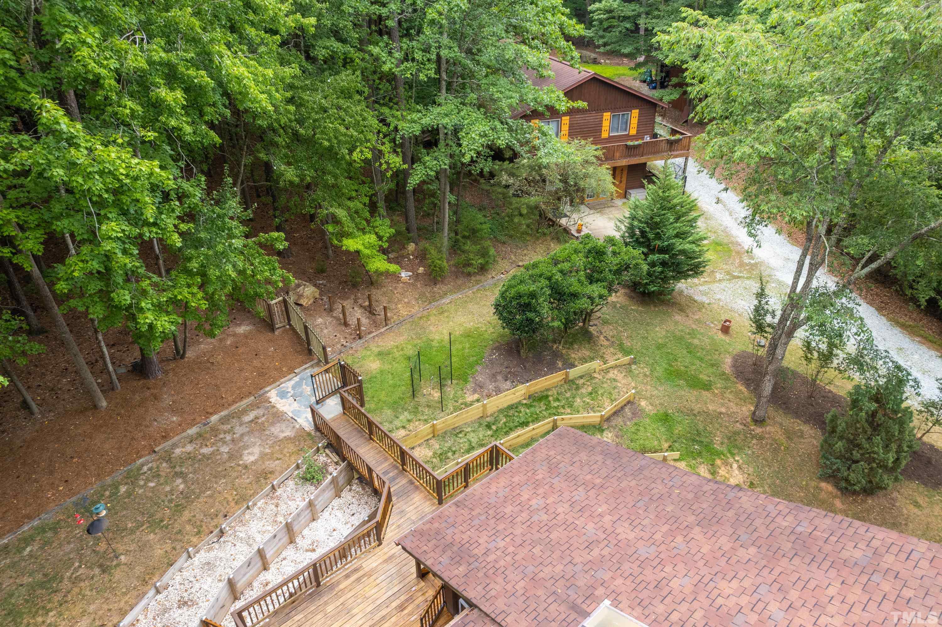 2600 Ferrand Drive Durham, NC 27705 - Photo 55 of 67 a view of a house with a yard