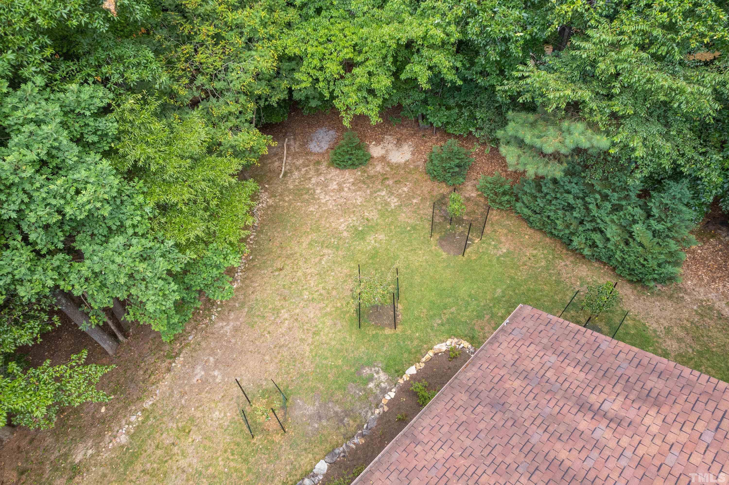2600 Ferrand Drive Durham, NC 27705 - Photo 59 of 67 a view of a lake with a yard