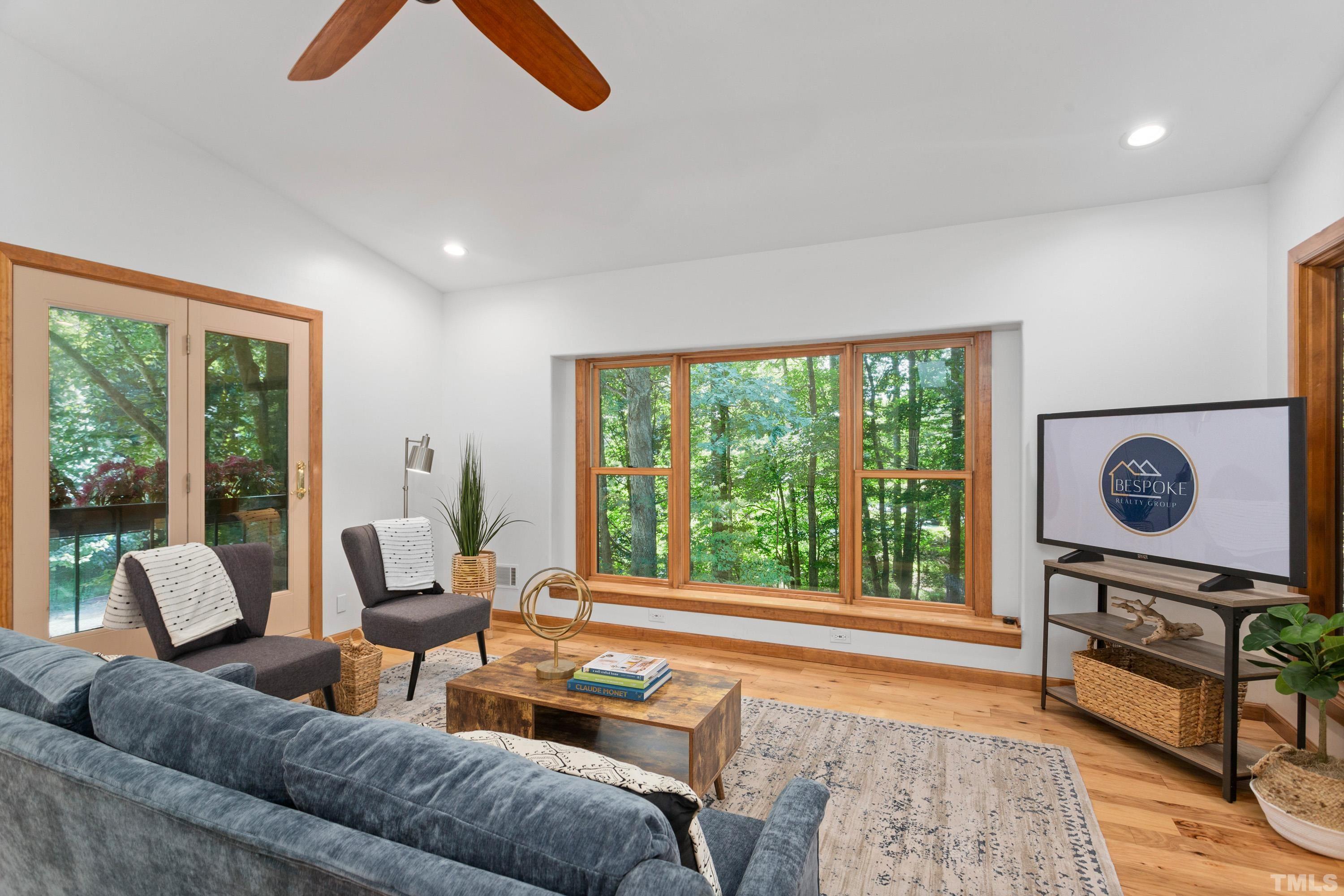 2600 Ferrand Drive Durham, NC 27705 - Photo 6 of 67 a living room with furniture and a window