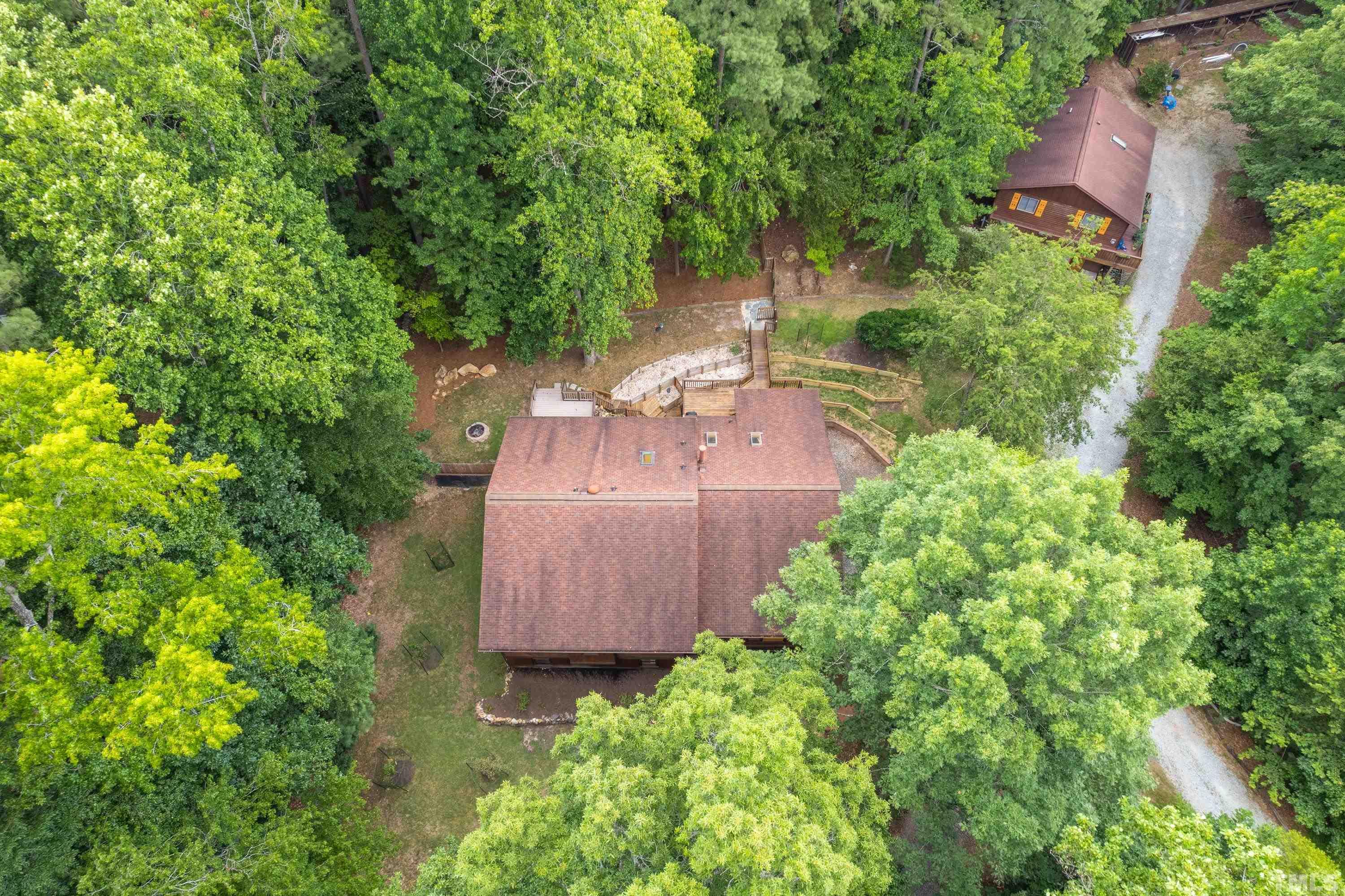 2600 Ferrand Drive Durham, NC 27705 - Photo 63 of 67 an aerial view of a house with garden space and street view