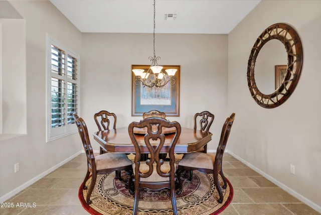 a kitchen with granite countertop a sink stove and cabinets