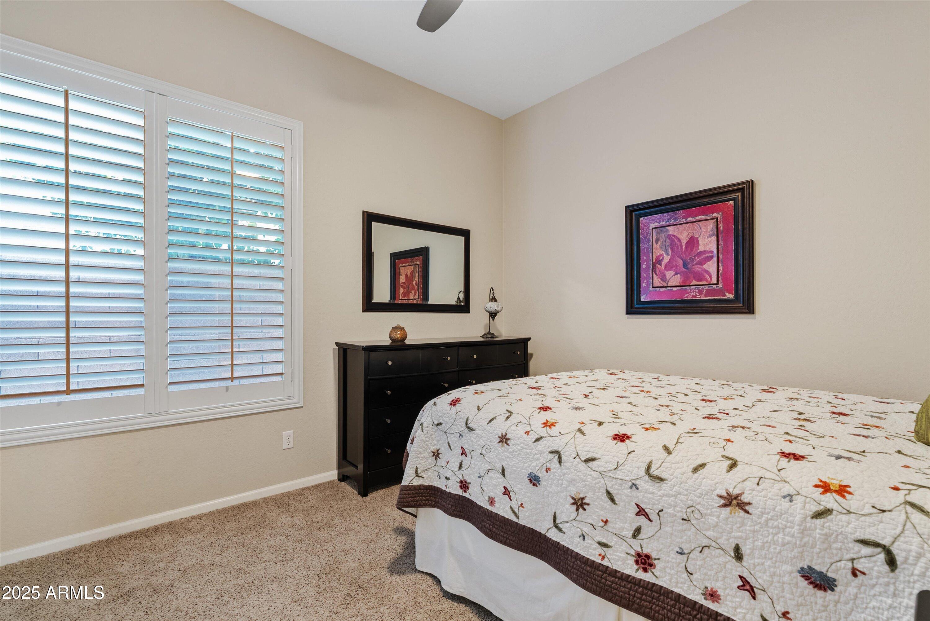 6805 Rachael Way Gilbert, AZ 85298 - Photo 25 of 50 a bedroom with a bed and a window