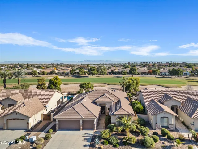 an aerial view of a house with a outdoor space