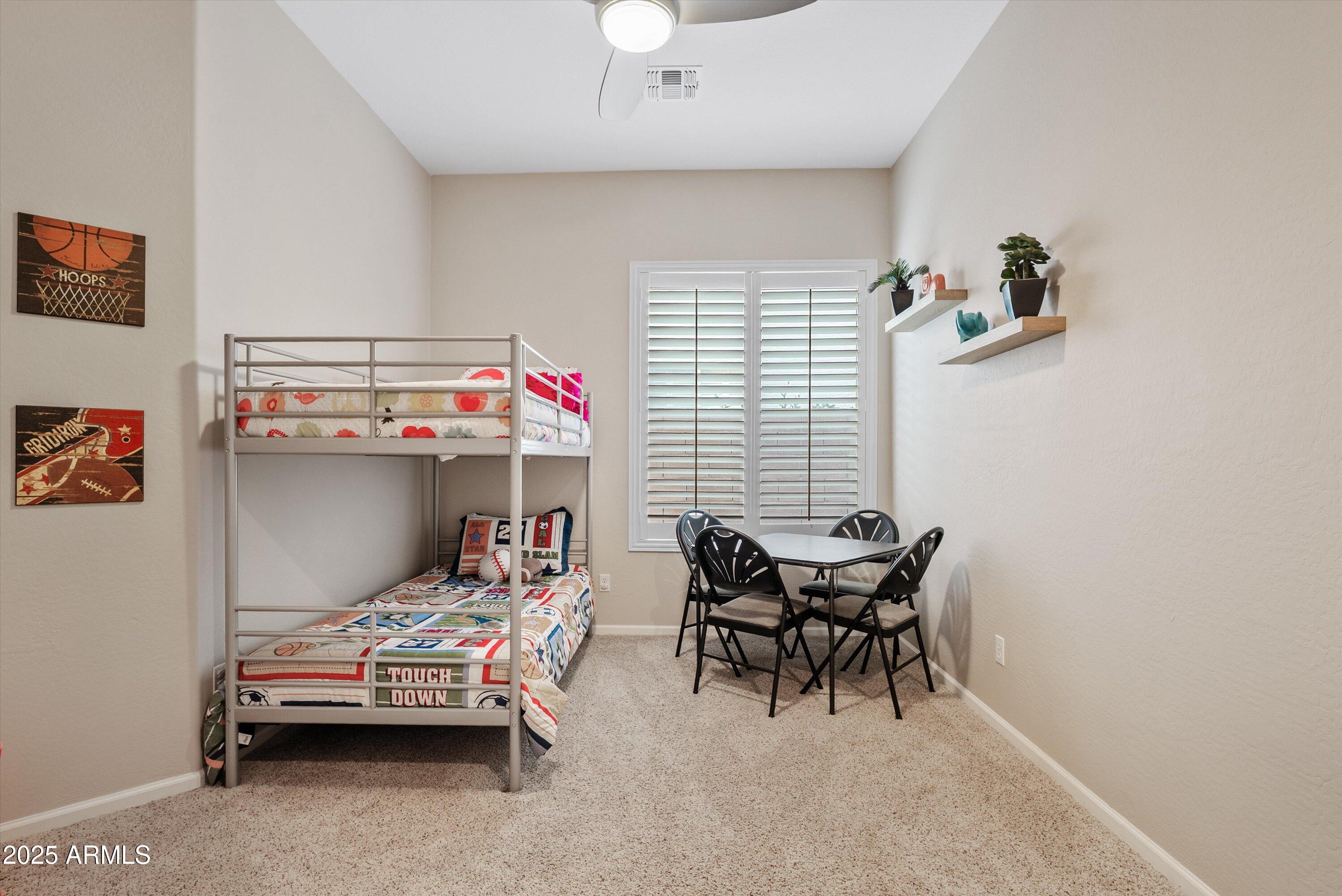 6805 Rachael Way Gilbert, AZ 85298 - Photo 31 of 50 a bedroom with furniture and a window
