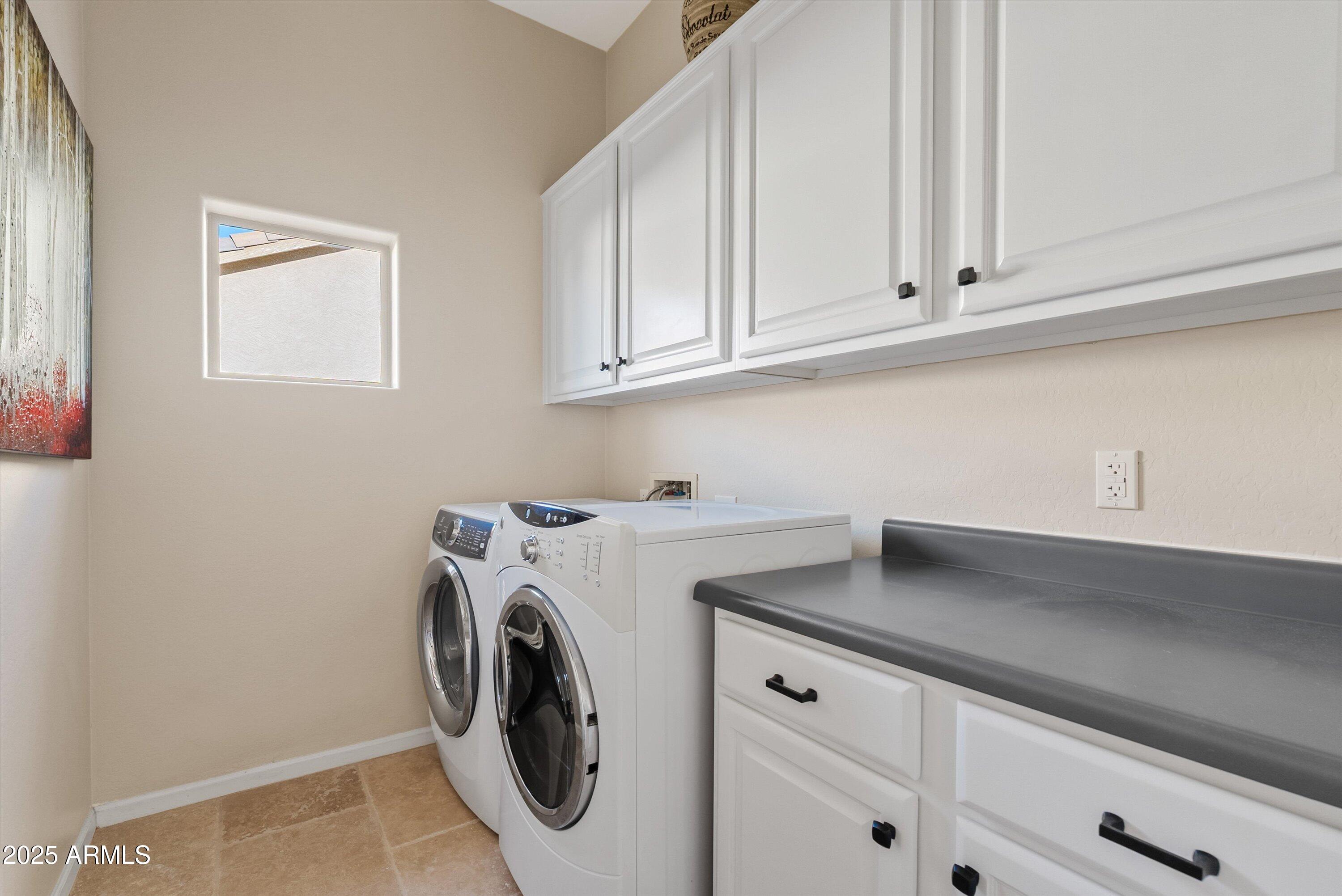 6805 Rachael Way Gilbert, AZ 85298 - Photo 33 of 50 a utility room with dryer and washer