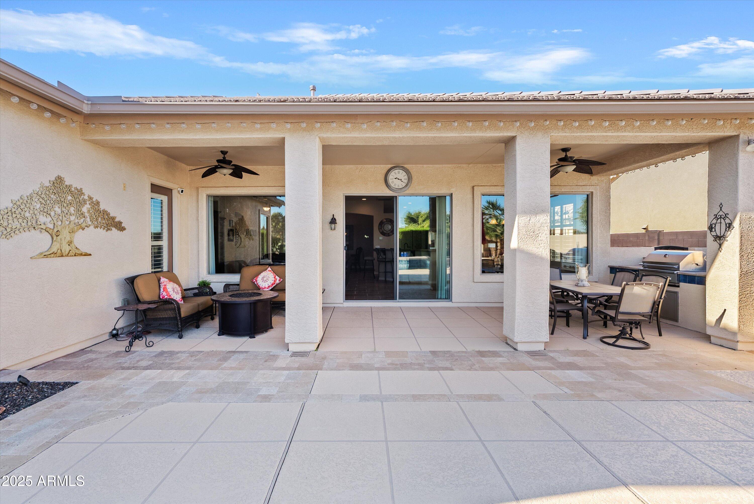 6805 Rachael Way Gilbert, AZ 85298 - Photo 35 of 50 a lobby with furniture and a potted plant