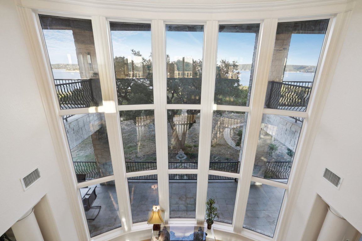 14701 Hornsby Hill Road Austin, TX 78734 - Photo 14 of 40 a view of a balcony with wooden floor