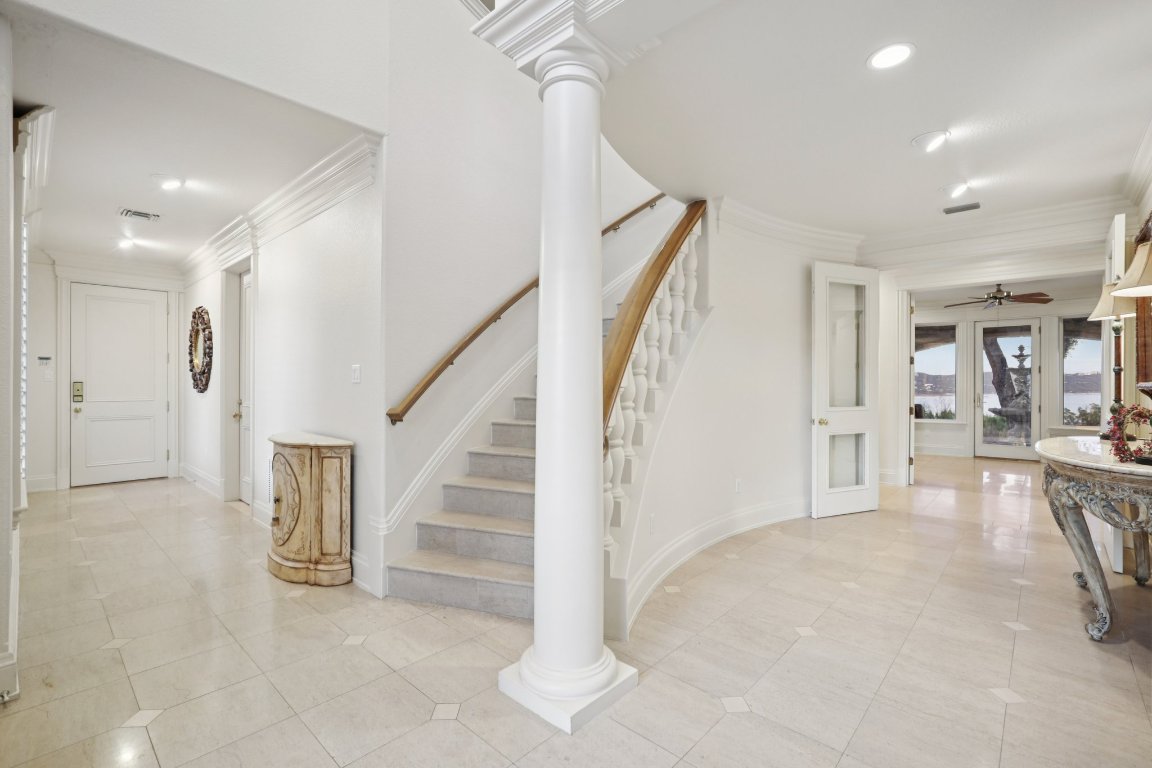 14701 Hornsby Hill Road Austin, TX 78734 - Photo 3 of 40 a view of a hallway view with staircase